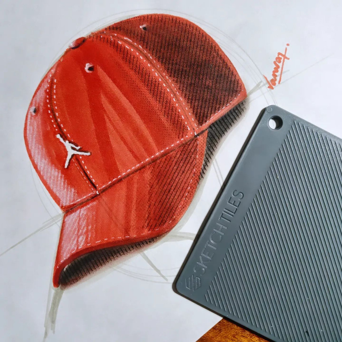 Red baseball cap by Dr. Kanvar Nayer