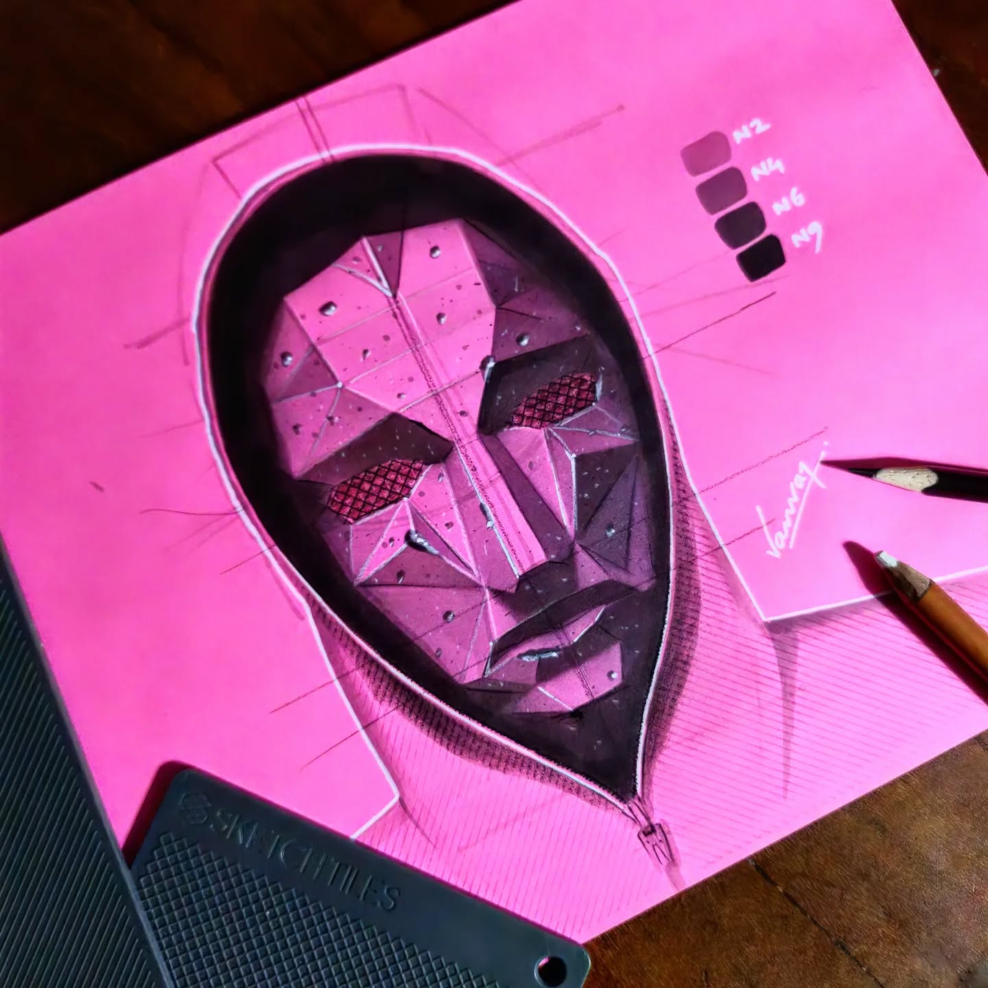 Faceted mask study on pink paper by Dr. Kanvar Nayer