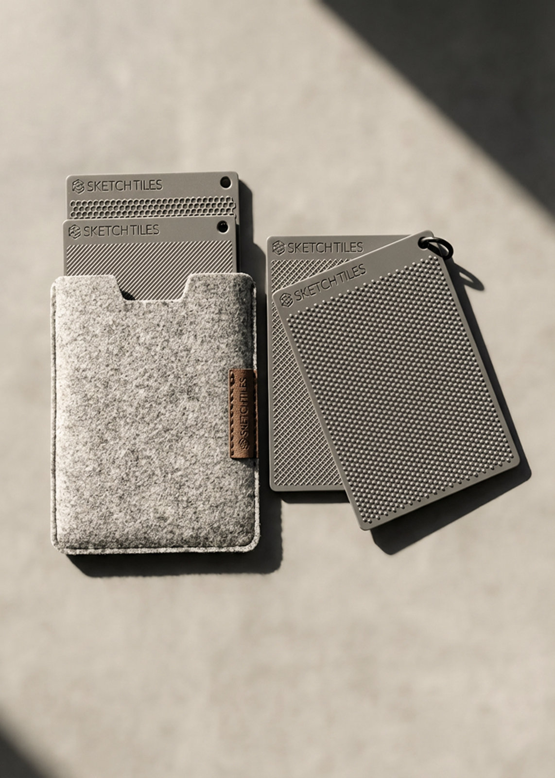 All four SketchTiles with the felt carry case and keyring