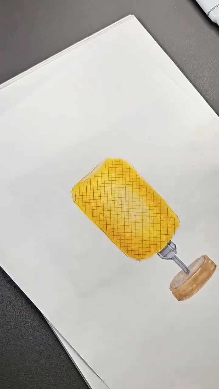 Yellow lampshade sketch with a grid made from two crossing sets of pencil lines.