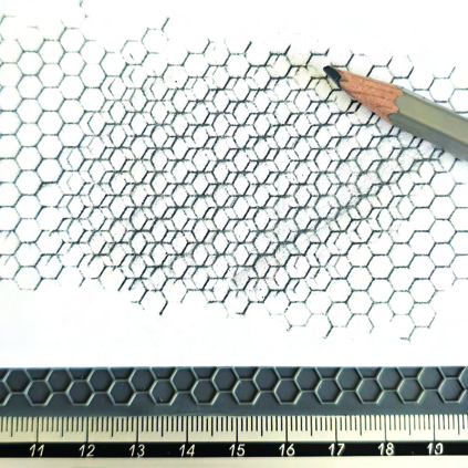 Two slightly offset hexagonal patterns overlap to create a denser texture.