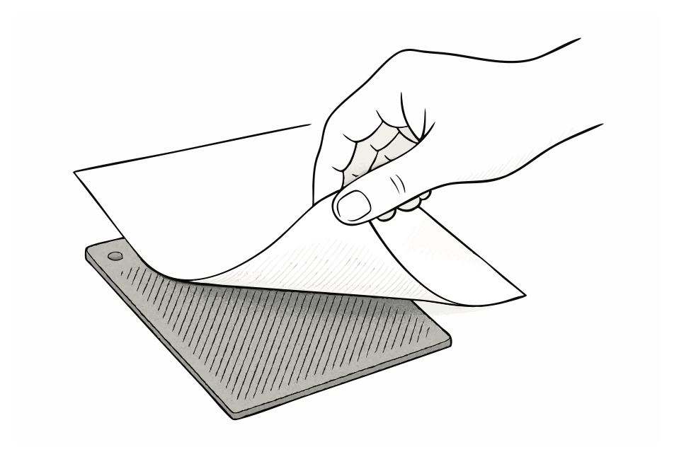 A hand slides a Diagonal Lines Tile underneath a sheet of paper.