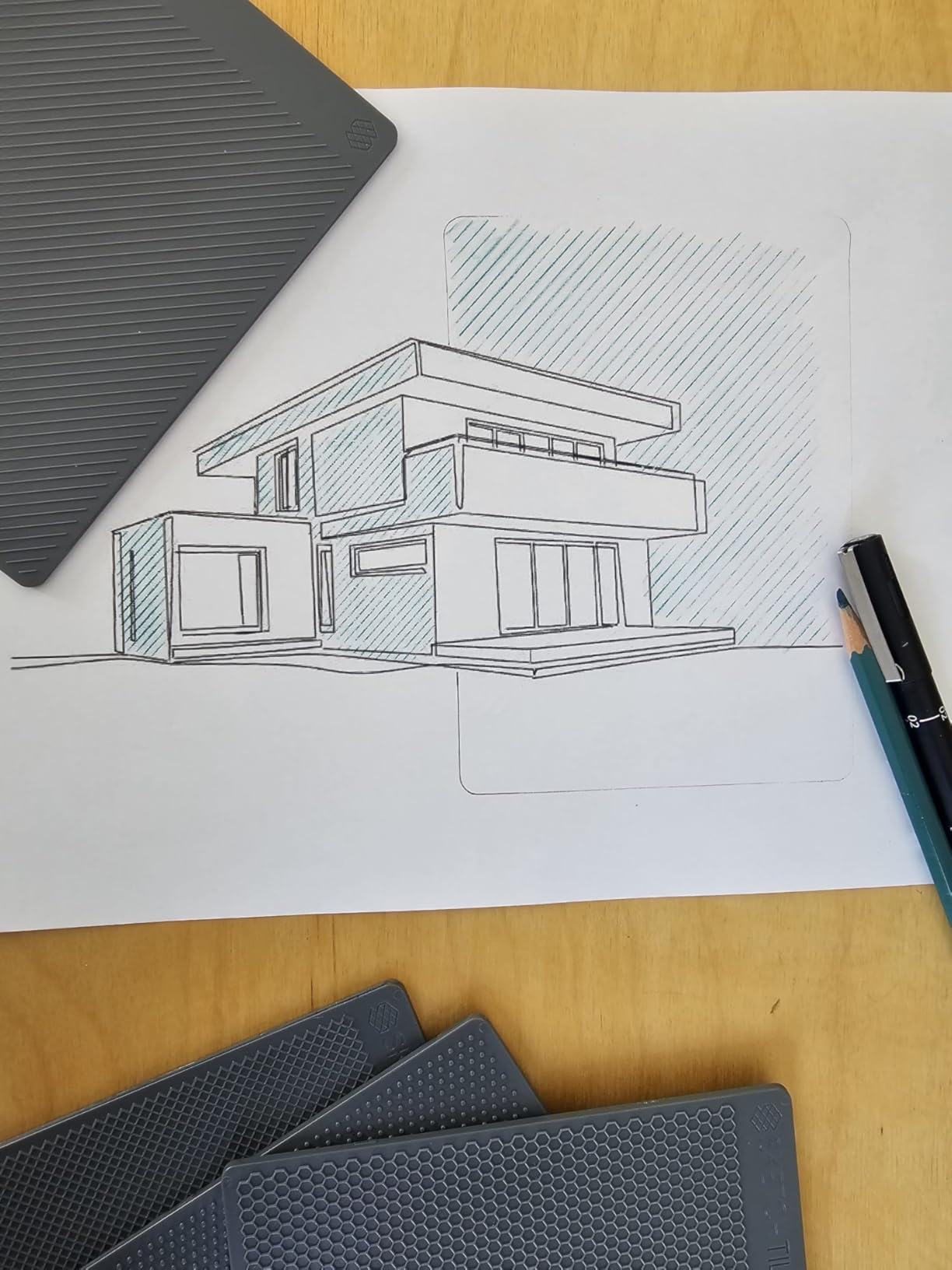 Nir mualem’s architectural sketch with diagonal texture and SketchTiles around the paper